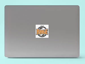 sticker-mockup-featuring-an-open-macbook-pro-300